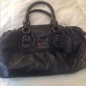 Coach patent leather purse.